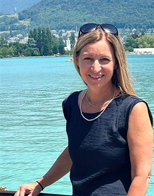 photo of Kelly Hynes with river behind her